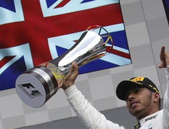 Hamilton fends off Vettel to win at Spa