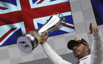 Hamilton fends off Vettel to win at Spa
